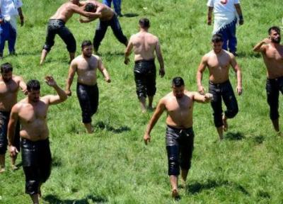 (تصاویر) مسابقات کشتی با بدن روغنی